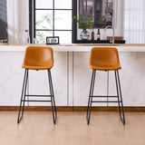 Set of 2 brown counter and bar height stools styled at a kitchen island with modern decor
