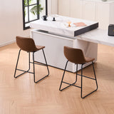 Set of 2 brown counter and bar height stools styled at a kitchen island with modern decor