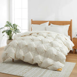 The down comforter is brushed in the pearly tones of off-white. Bring sophisticated elegance to your bedroom decor with this off-white bed comforter.