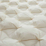 The down comforter is brushed in the pearly tones of off-white. Bring sophisticated elegance to your bedroom decor with this off-white bed comforter.