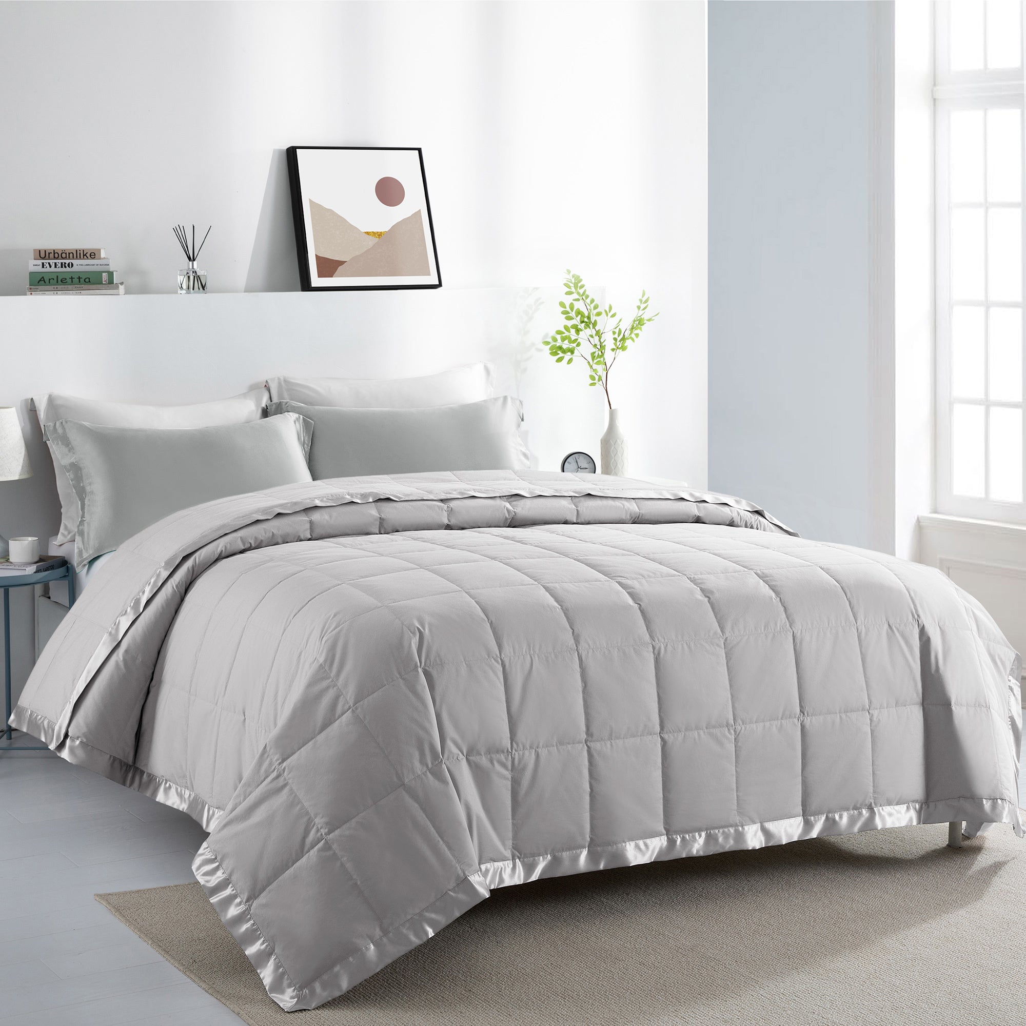 Lightweight light gray down blanket with 100% cotton cover and box quilting, featuring contrast piping and breathable comfort for year-round use