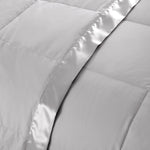 Lightweight light gray down blanket with 100% cotton cover and box quilting, featuring contrast piping and breathable comfort for year-round use