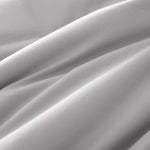 Lightweight light gray down blanket with 100% cotton cover and box quilting, featuring contrast piping and breathable comfort for year-round use