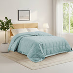 Lightweight winter sky down blanket with 100% cotton cover and box quilting, featuring contrast piping and breathable comfort for year-round use