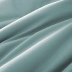 Lightweight winter sky down blanket with 100% cotton cover and box quilting, featuring contrast piping and breathable comfort for year-round use