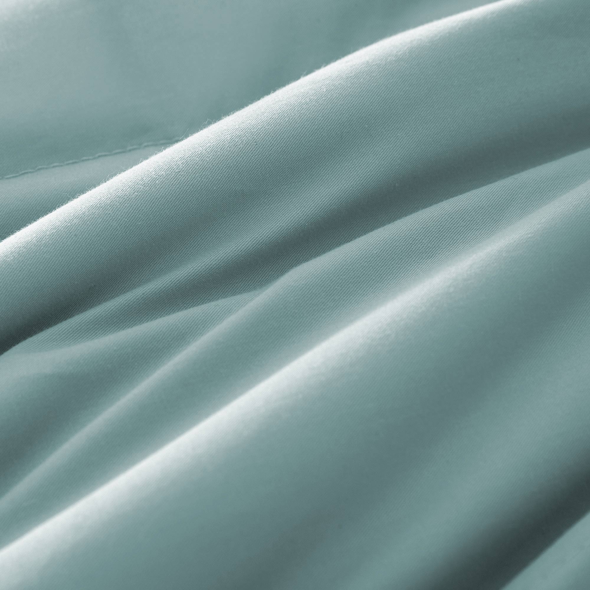 Lightweight winter sky down blanket with 100% cotton cover and box quilting, featuring contrast piping and breathable comfort for year-round use