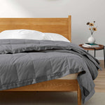 Lightweight dark gray down blanket with 100% cotton cover and box quilting, featuring contrast piping and breathable comfort for year-round use