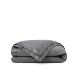 Lightweight dark gray down blanket with 100% cotton cover and box quilting, featuring contrast piping and breathable comfort for year-round use