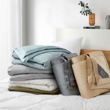 Down blanket with 100% cotton cover and box quilting, lightweight and breathable for year-round comfort