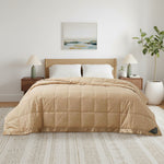 Lightweight pearled ivory down blanket with 100% cotton cover and box quilting, featuring contrast piping and breathable comfort for year-round use