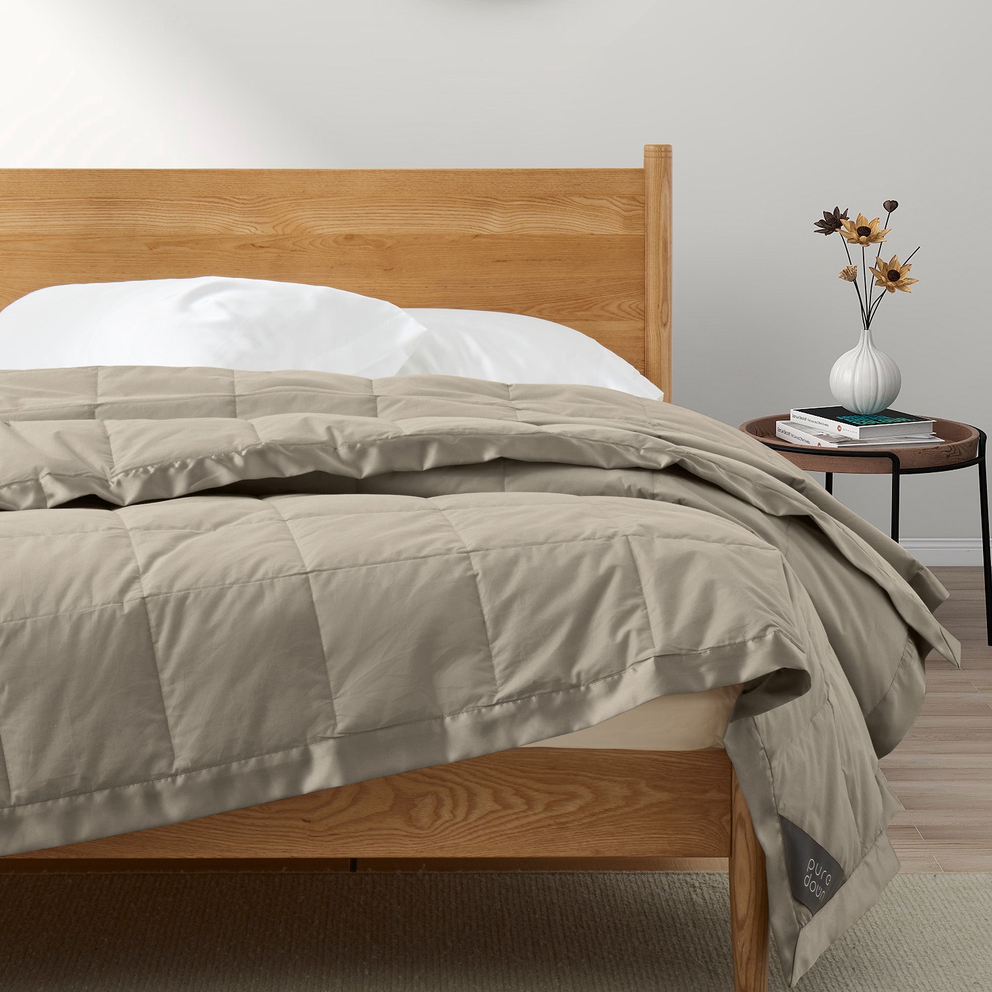 Lightweight vintaged khaki down blanket with 100% cotton cover and box quilting, featuring contrast piping and breathable comfort for year-round use