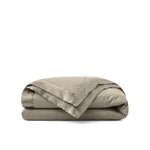 Lightweight vintaged khaki down blanket with 100% cotton cover and box quilting, featuring contrast piping and breathable comfort for year-round use