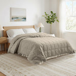 Lightweight vintaged khaki down blanket with 100% cotton cover and box quilting, featuring contrast piping and breathable comfort for year-round use