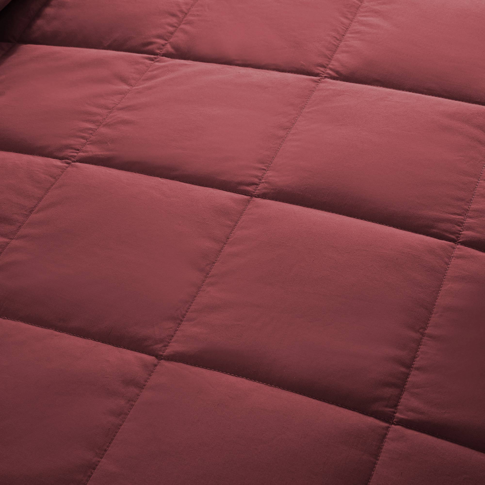 Lightweight wine red down blanket with 100% cotton cover and box quilting, featuring contrast piping and breathable comfort for year-round use