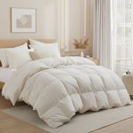 Crafted with a 100% organic cotton shell and filled with 90% natural white down, this comforter offers superior warmth and breathability. Its 800 fill power ensures a lightweight yet insulating sleep experience. Designed for year-round comfort, it features baffle box construction to maintain even fill distribution. Available in all-season and extra warm options, this comforter combines eco-friendly materials with luxurious softness for a restful night's sleep.