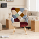 Patchwork accent armchair styled in a cozy living room, featuring multicolor jacquard upholstery and wooden legs