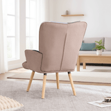 Back view of purple and blue patchwork accent armchair with smooth fabric back and solid wood legs