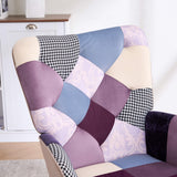 Close-up of purple and blue jacquard patchwork upholstery on the tufted backrest of the accent chair