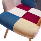 Close-up of patchwork upholstered seat cushion with foam padding and stitched fabric panels
